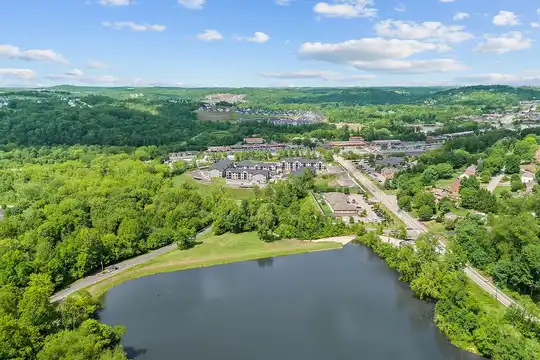 Aerial view of McMurray, PA showing residential neighborhoods, greenery, and a lake in Washington County.