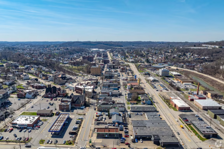 Aerial view of Carnegie, PA showing downtown buildings and neighborhoods in Allegheny County.
