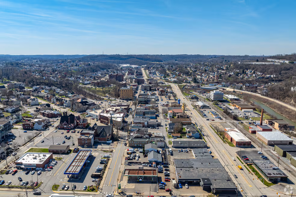 Aerial view of Carnegie, PA showing downtown buildings and neighborhoods in Allegheny County.